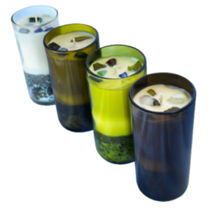 Variety 4 pack, scents include lavender, sweet tobacco, citronella/rosemary and coffee/vanilla. All candles are hand poured into a repurposed glass made out of wine bottles. Candles come in clear, yellow, green and brown. The bottom is filled with sand and sea glass.